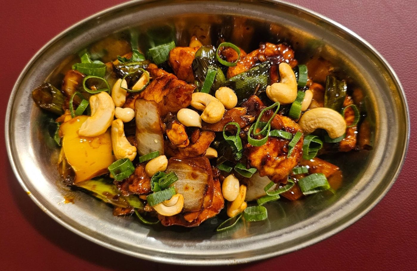 Pollo Kung Pao con anacardi e cipollotto